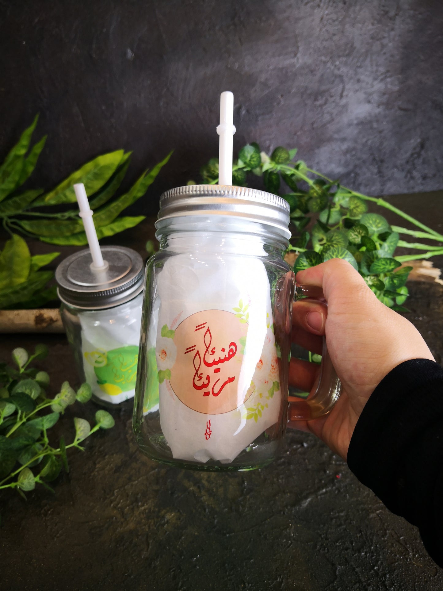 Glass cup with straw and lid